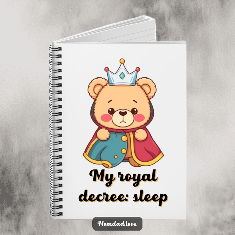 Funny notebook featuring a bewildered teddy bear wearing a small crown and royal robe, perfect for jotting down thoughts with a touch of regal humor.