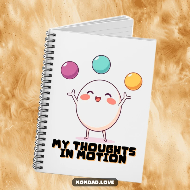 Funny Notebook cover showing a round character with small limbs, excitedly juggling three bright balls.
